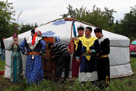 Mongolians in traditional clothes photo