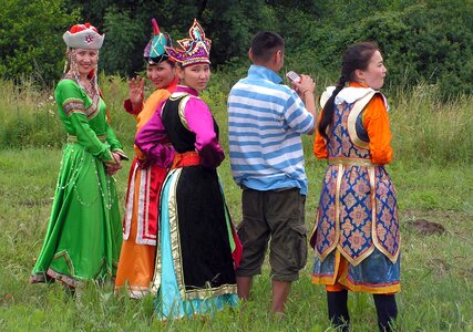 Mongolians in traditional costumes photo