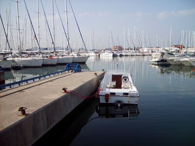 Boat in port – Split, Croatia photo