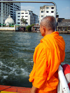 Buddhist monk on ship photo