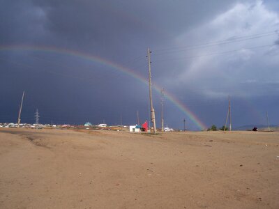 Rainbow in desert, Mongolia photo