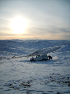 Car stuck in the snow – Mongolia photo