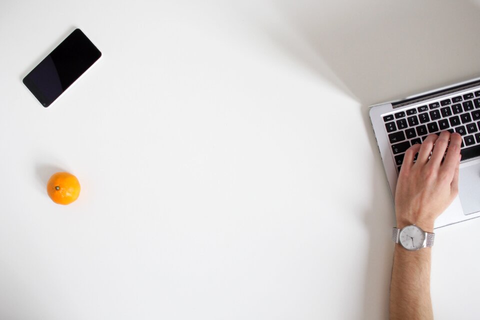 workspace typing MacBook