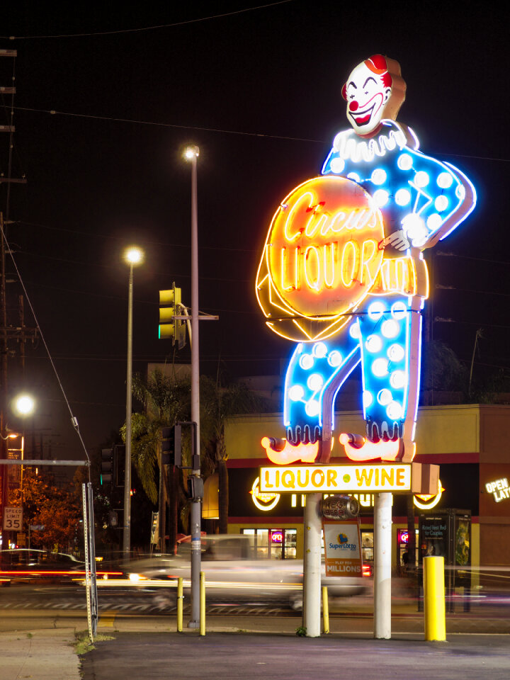 Circus Liquor clown sign at night 2015-08-17