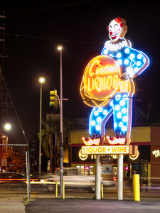 Circus Liquor clown sign at night 2015-08-17