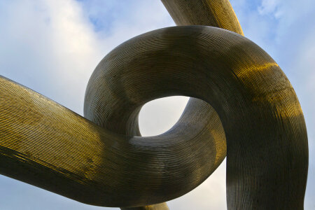Intertwined metallic tubes sculpture photo