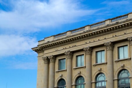Neoclassical facade against blue sky photo