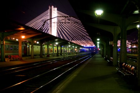 Empty railway platform at night photo