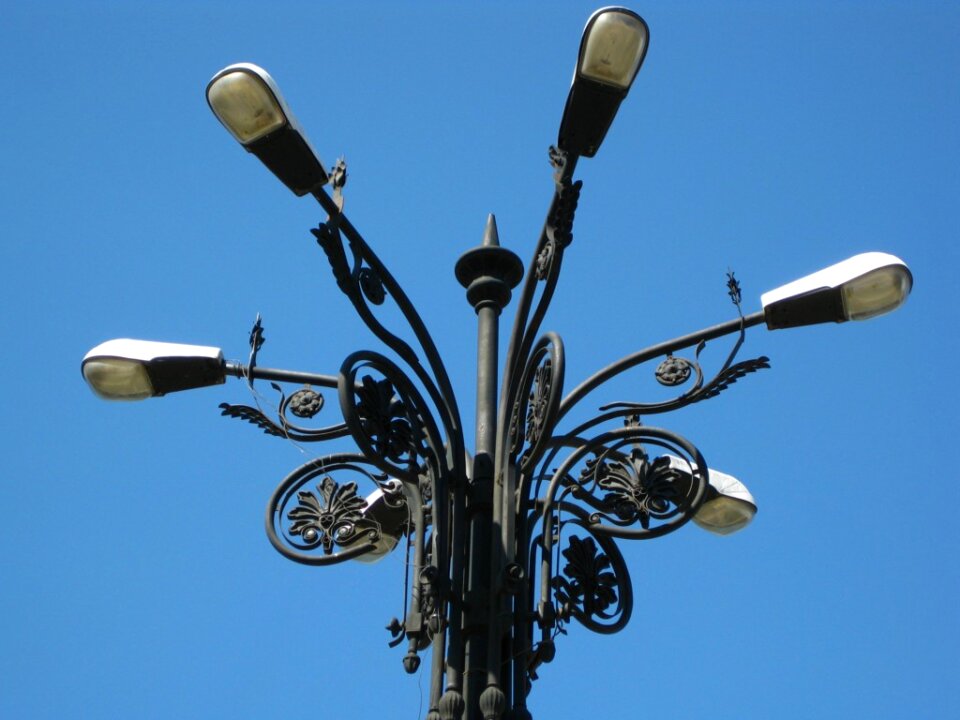 Street light against blue sky