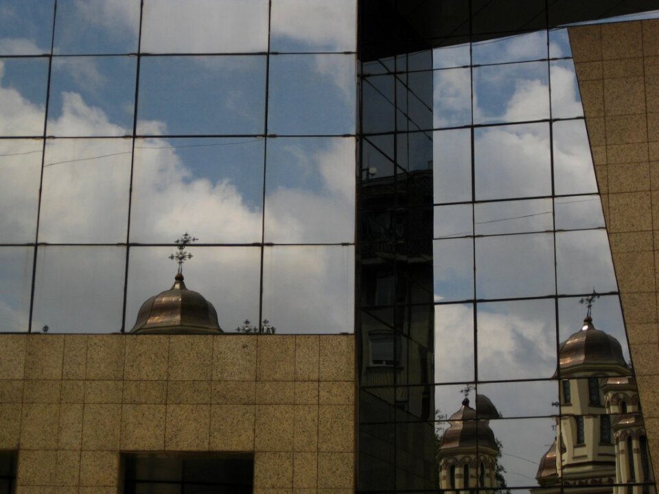 Church mirroring on office building