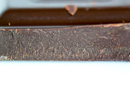 Dark chocolate tablet detail macro photo