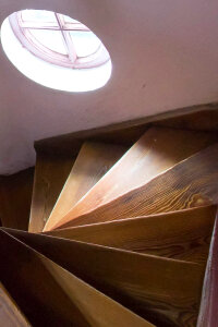 Narrow spiral staircase photo