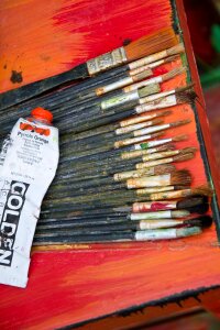 Painter's brushes and paint tube
