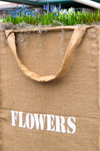 Sackcloth bag with flowers photo