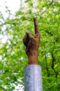 Finger pointing sculpture