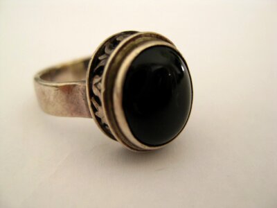 Silver ring with large black stone