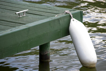 Green pontoon buoy photo