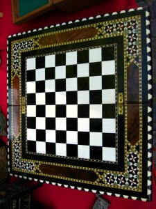 Folding wooden chess board