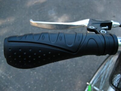 City bicycle handlebar grip and brake photo