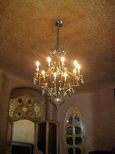 Chandelier on mosaic ceiling