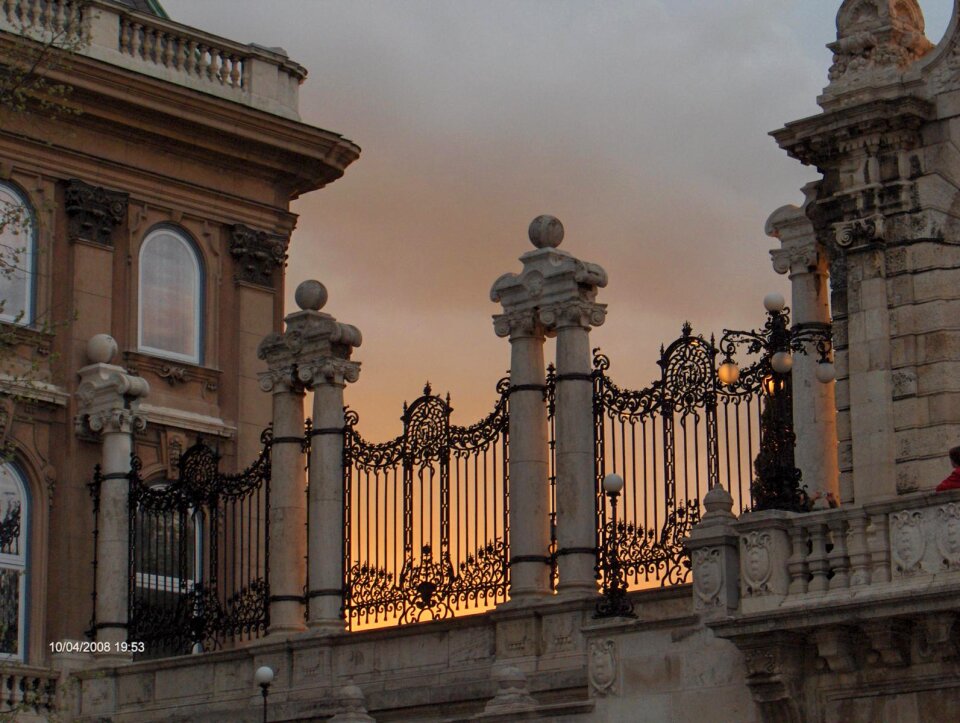 Sunset behind iron gates