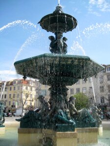 Baroque fountain in Rossio Square photo