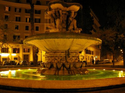 Piazza dei Quiriti fountain at night photo