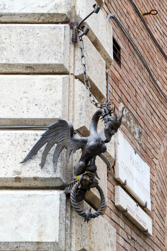 Winged devil statue