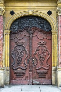 Crown adorned doors of baroque building