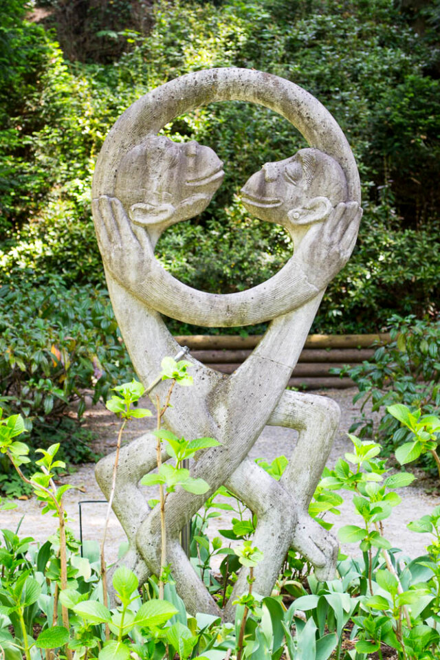 Two monkeys hugging art piece