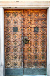Wooden door with nailings photo
