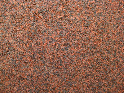 Black and orange mineral sand texture