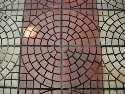 Concentric reddish and grey pavement photo