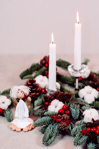 Christmas spruce decoration with candles and an angel 2 photo