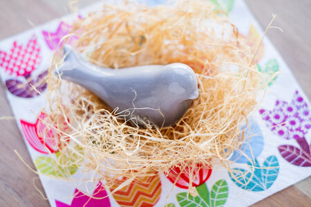 Ceramic bird in a nest