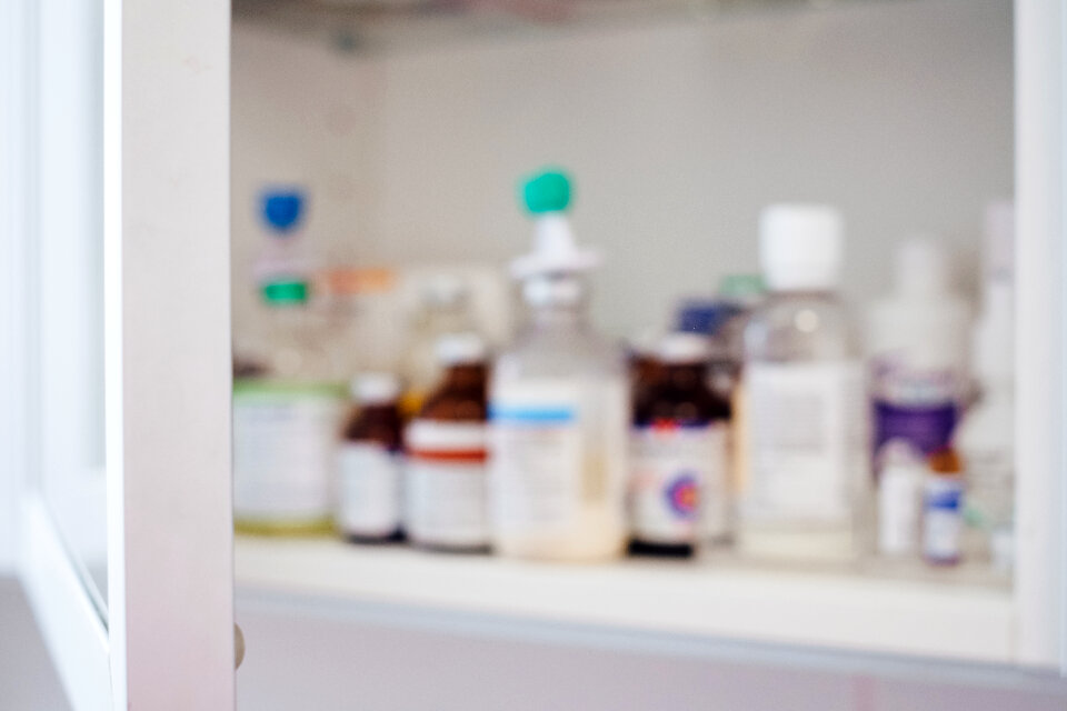 Medicine bottles on a shelf photo