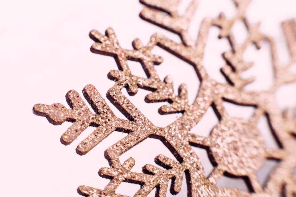 Gold glitter snowflake closeup 2