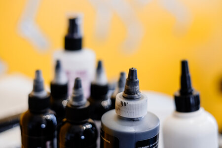 Tattoo ink bottles closeup photo