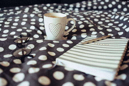 Dreams notebook, glasses and coffeemug photo