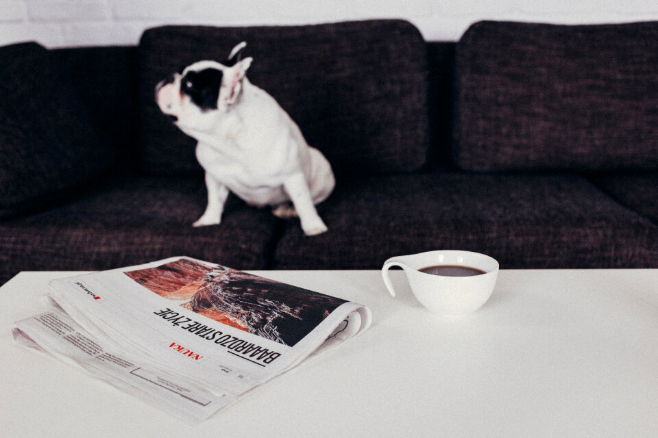 Cup of coffee and a newspaper on the table 3