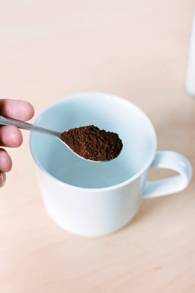 Ground coffee in a spoon 2 photo