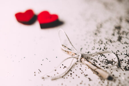 Tiny letter and wooden hearts 4 photo