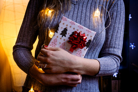 A female holding a christmas gift 4 photo