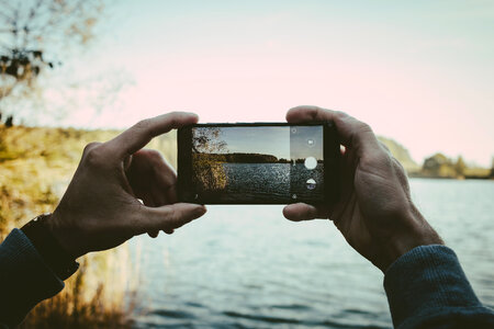 Man taking a picture with his cellphone 2