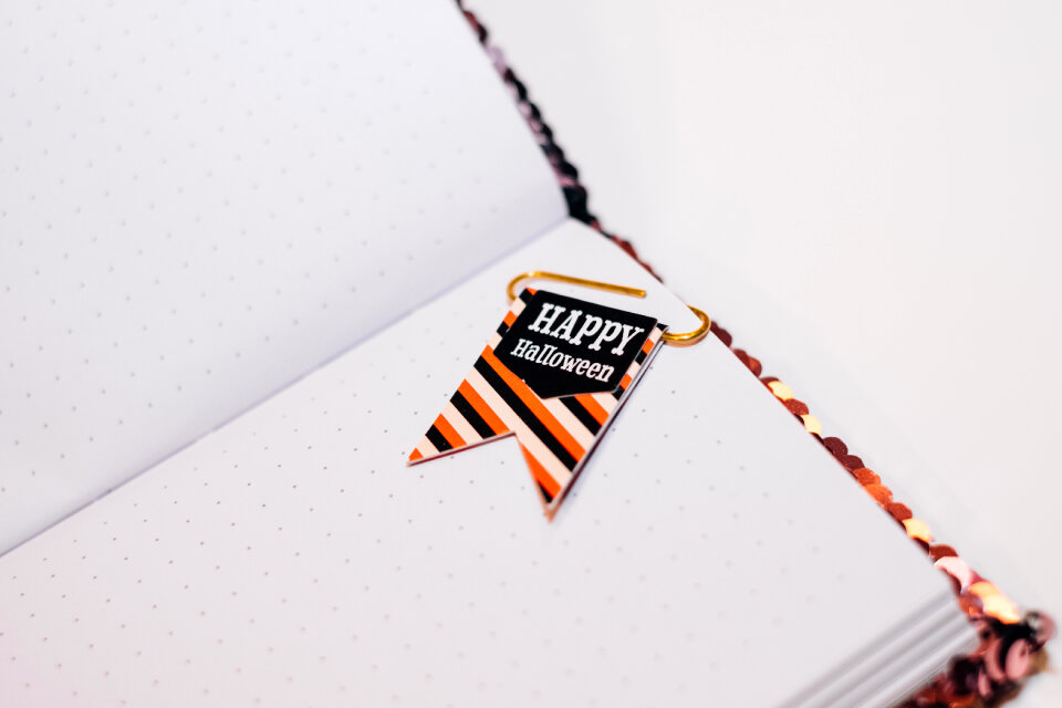 Happy Halloween paperclip in a notebook photo