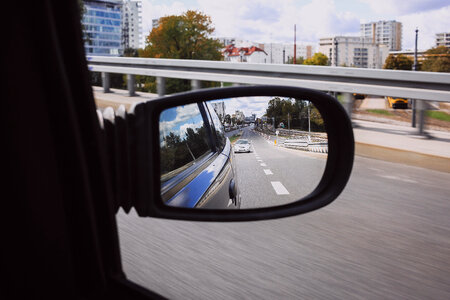 Reflection in a car side mirror photo