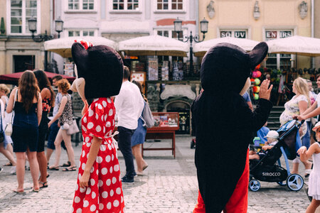 Mickey and Minnie waving at tourists photo