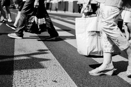 Pedestrian crossing in black and white photo