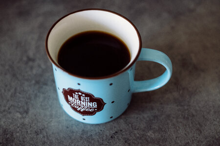 Black coffee in a retro mug photo
