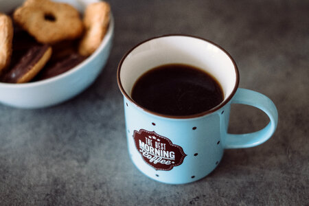Black coffee and biscuits photo